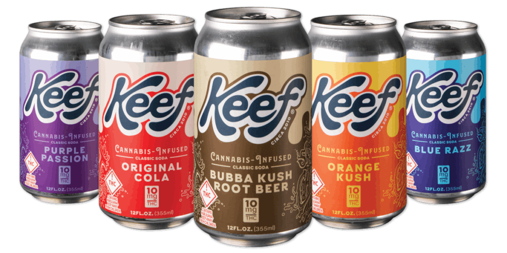 Photo of 5 different flavors of Keef soda in cans. Flavors include Purple Passion, Original Cola, Bubba Kush Root Beer, Orange Kush, and Blue Razz. 